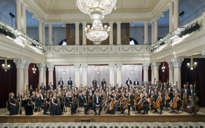 Members of the National Symphony Orchestra of Ukraine pose for this photo released by KHAM Inc. on May 31, 2023