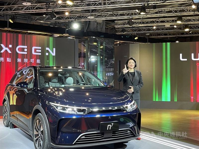 Yulon Motor Co. Chariperson Yen Chen Li-lien poses with a Luxgen n7 SUV, at the launch of the new electric model on Oct. 20, 2022. CNA photo