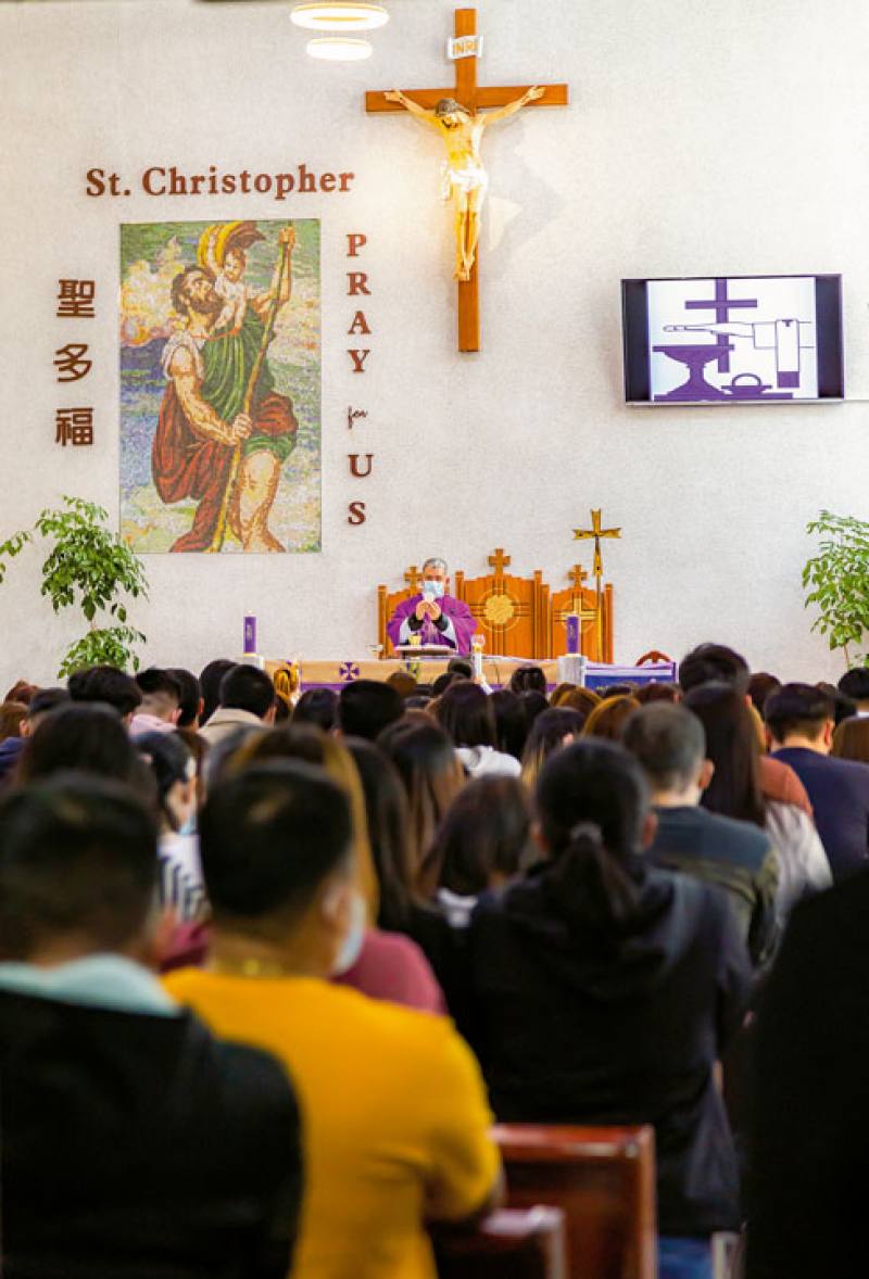 Filipino Catholics attend a Tagalog-language mass at St. Christopher Church.