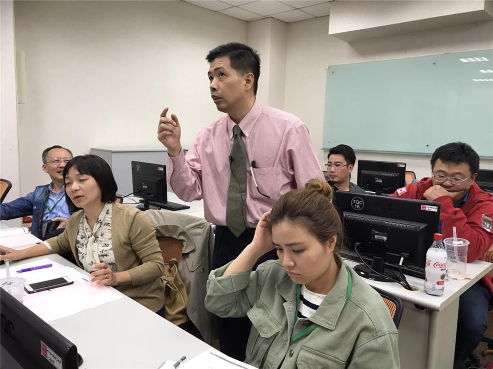 Participants learning about website production and e-commerce