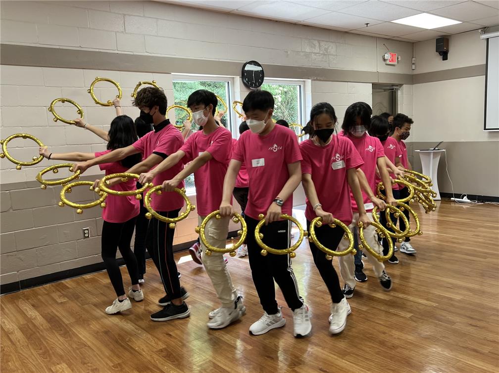 Practicing the golden hoop performance.