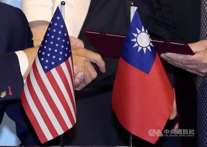 Biden signs law approving first part of U.S. trade pact with Taiwan.