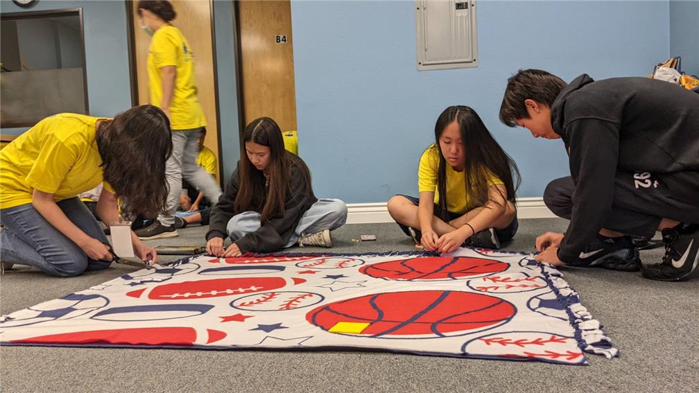 Community Warmth Initiative: FASCA members made blankets for those in need.