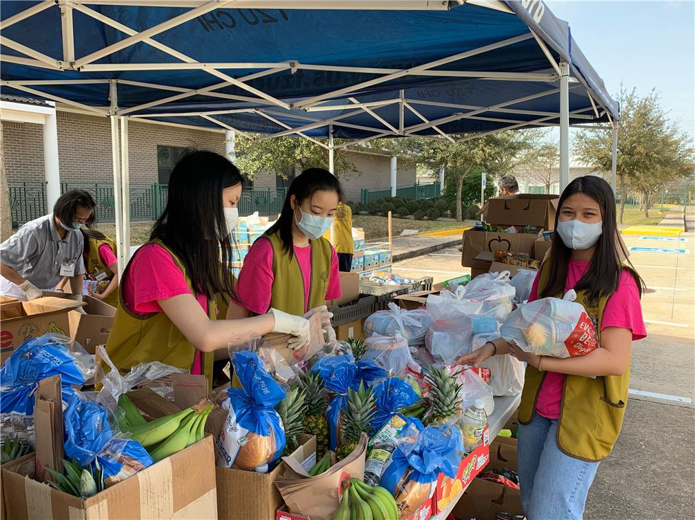 Charity Events: FASCA assisted in distributing food. 