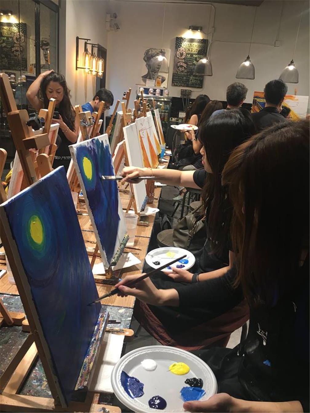 Participants totally immersed in their painting