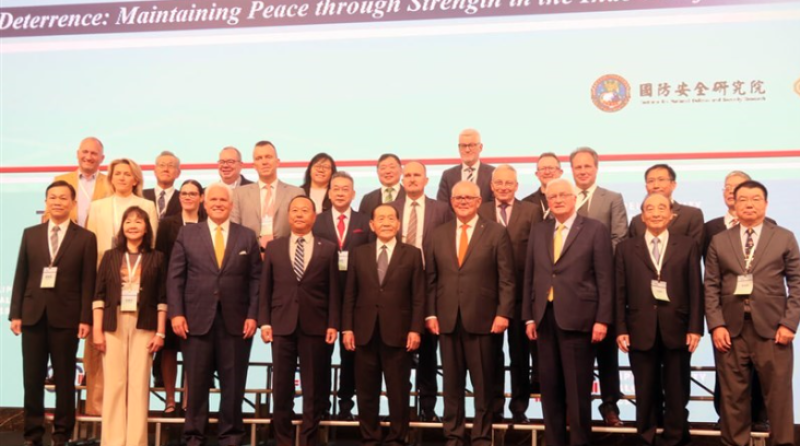 Former Australian Prime Minister Scott Morrison (front fourth left) poses for a photo at the 2025 Taipei Security Dialogue in Taipei on Wednesday. CNA photo Oct. 8, 2025