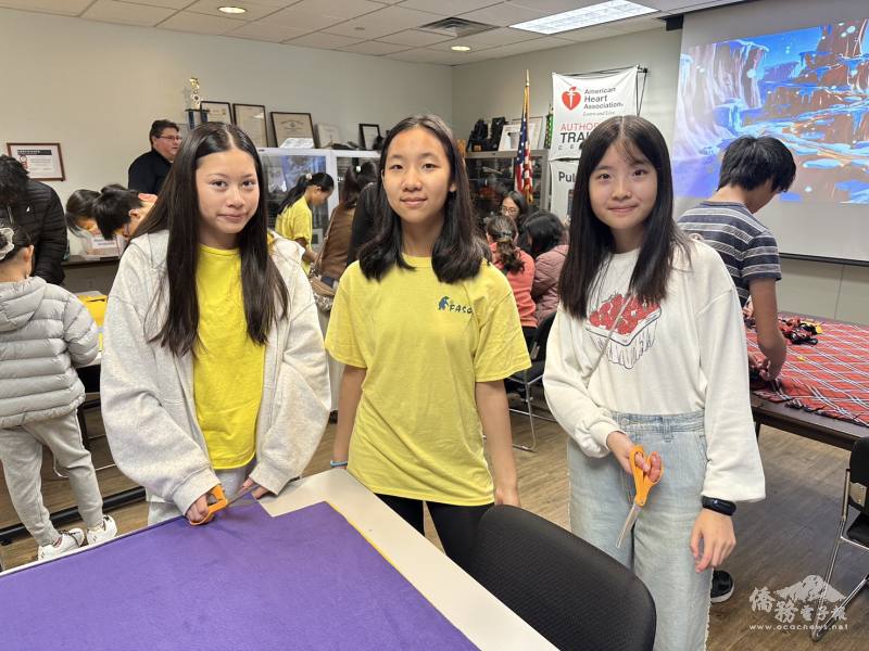 Teamwork: FASCA members work together to weave blankets, demonstrating teamwork and care.