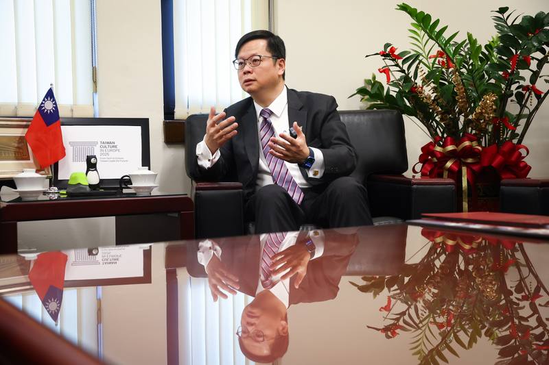 Eric Huang speaks to CNA during an interview on Tuesday. CNA photo Dec. 20, 2025