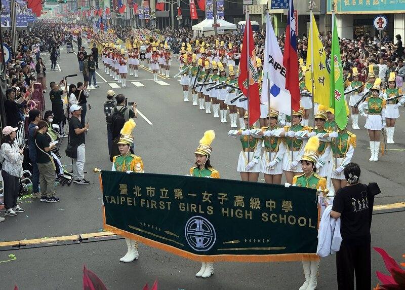 The Taipei First Girls High School Marching Band performs in Chiayi City on Saturday. CNA photo Dec. 20, 2025