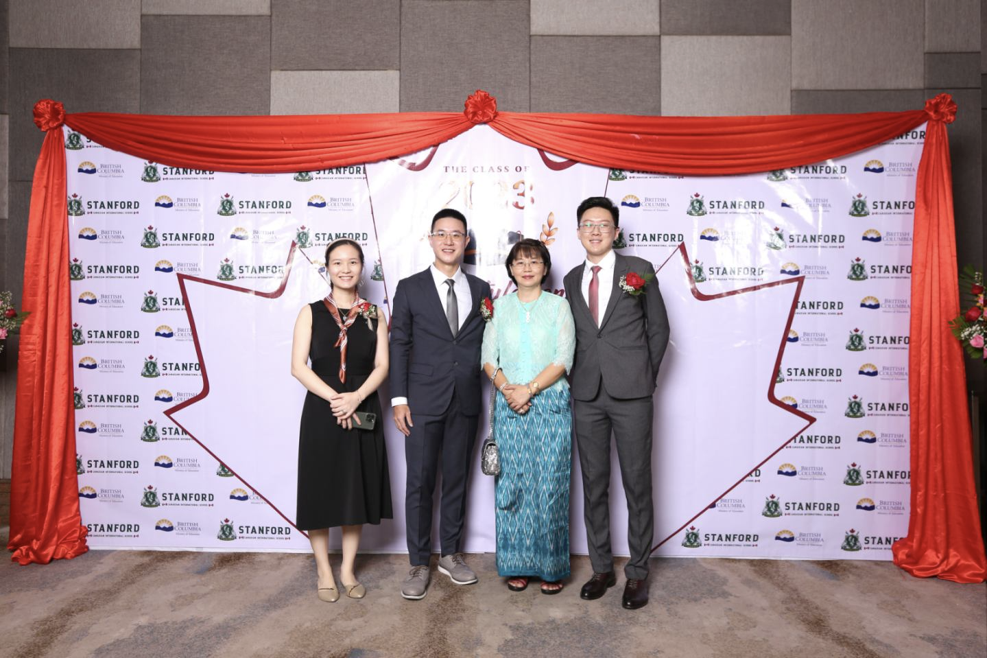 Yu-Nan Chen (second from left) runs an education venture in Myanmar with his wife, Wei-Ning Tsai (far left), his cousin Yen-Hsiang Cheng (far right), and their Myanmar business partner, Yu-Lan Huang (second from right).