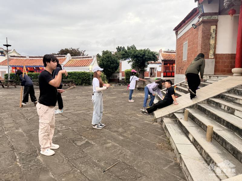 Experience traditional children’s games, including pitch-pot, ring toss, and stilt walking