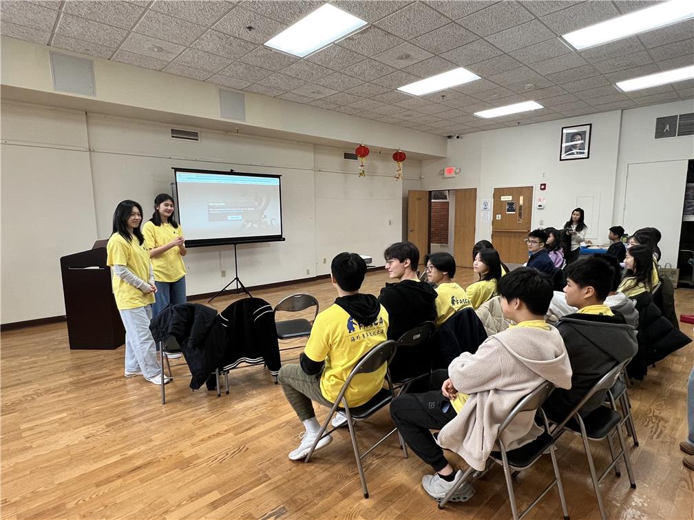 President Sophia Kao and Co-President Abby Kao lead the monthly training meeting.