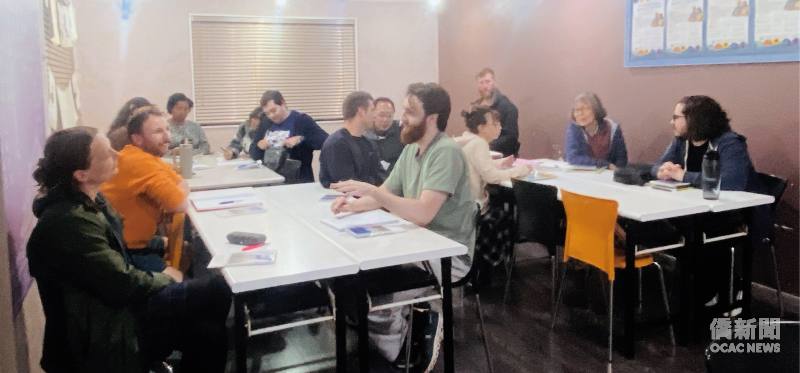 Practising Mandarin attentively with classmates in class(second from left)
